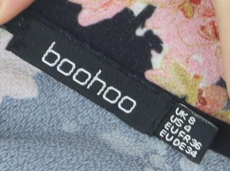 Boohoo Women's Black Floral Jumpsuit Size S