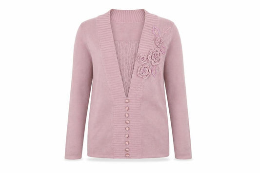 Front view of Damart women’s pink knit jumper, size UK 8, - flower detail