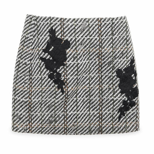 Front view of New Look women’s white check a-line skirt, size UK 8