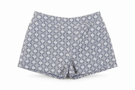Front view of F&F women’s blue floral hot pants shorts, size UK 23, in