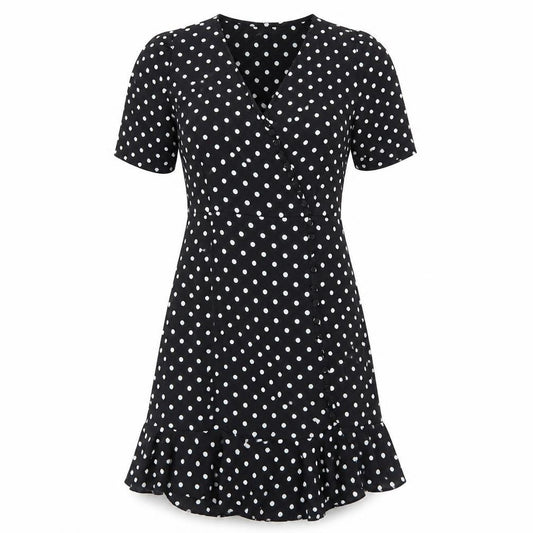 Front view of PRETTYLITTLETHING women’s black polka dot a-line, size UK 2