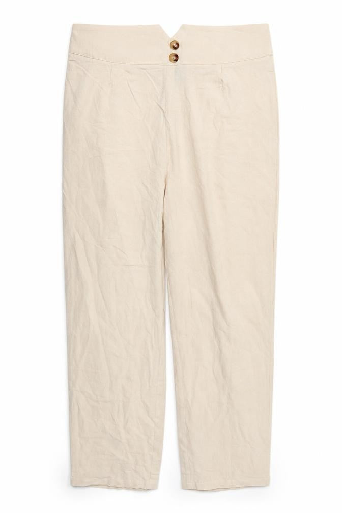 Front view of SHEIN women’s beige trousers, size XL, 28-inch leg