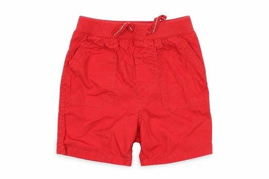 Front view of F&F girls’ red cargo trousers, size 9-12, months