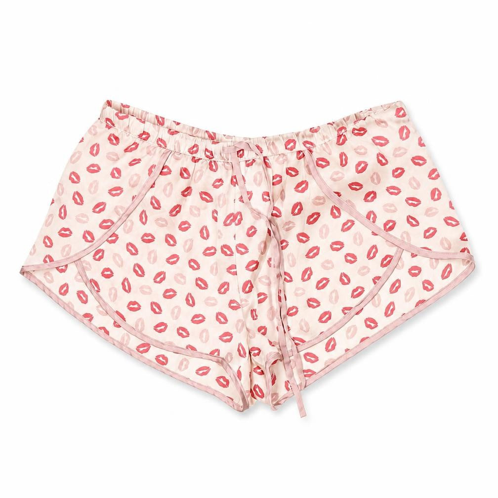 Front view of H&M women’s beige spotted hot pants shorts, size S