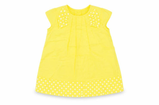 Front view of Next girls’ yellow polka dot a-line, size 3-6, months