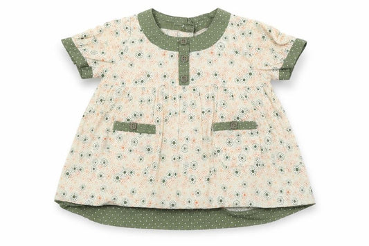 Front view of pre worn girls’ white fit & flare, size 9-12, months
