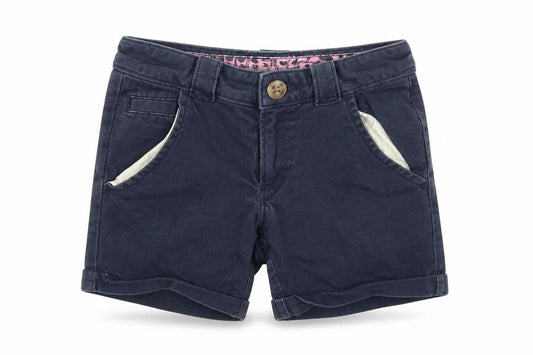 Front view of pre worn girls’ blue cut-off shorts, size 7, years