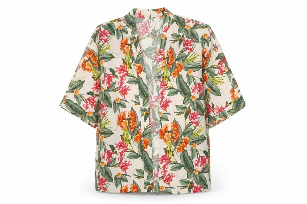 Front view of Primark women’s white floral cardigan jumper, size UK 14