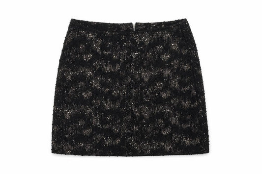 Front view of Next women’s black houndstooth flare skirt, size UK 10