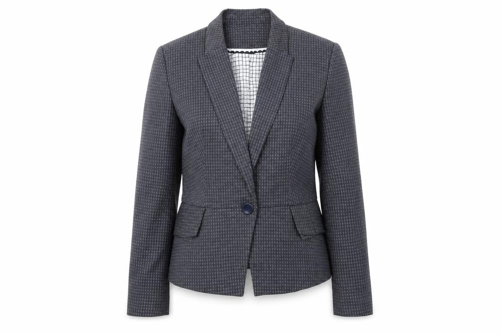 Front view of Marks & Spencer women’s blue spotted jacket suit jacket, size UK 12