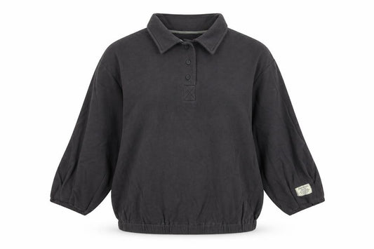Front view of Preworn women’s green basic polo, size M
