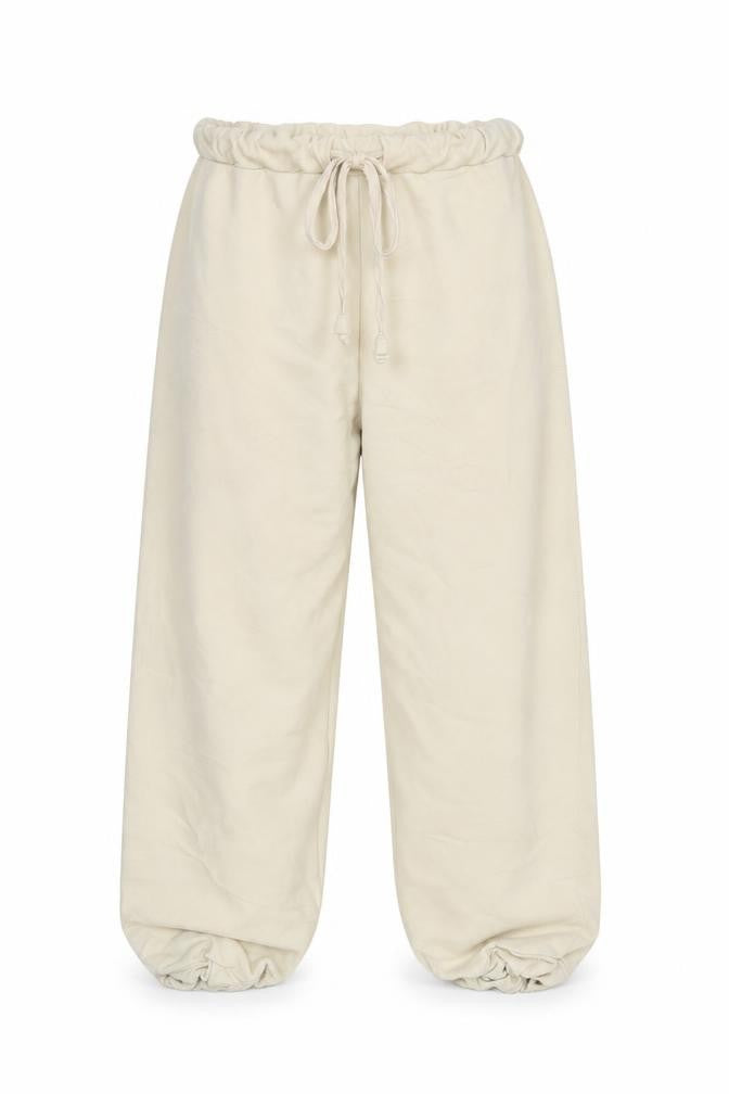 Front view of PRETTYLITTLETHING women’s white trousers, size UK 4, 22-inch leg
