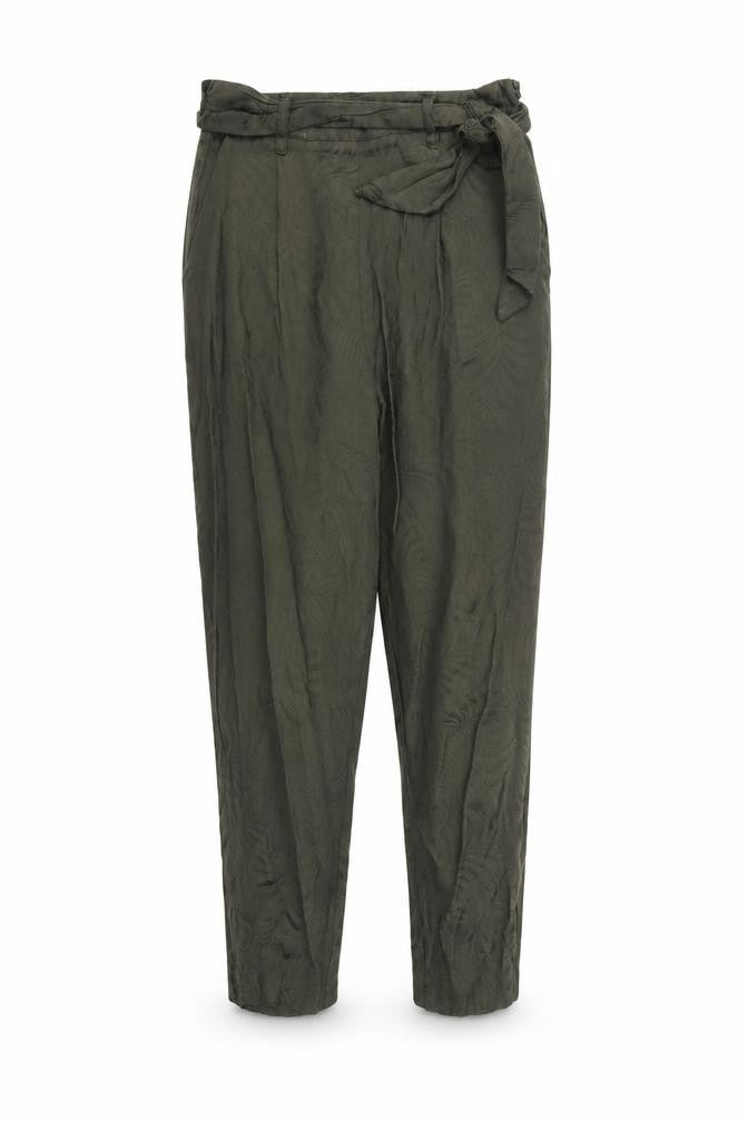 Front view of H&M women’s green trousers, size UK 8, 24-inch leg - leaf print