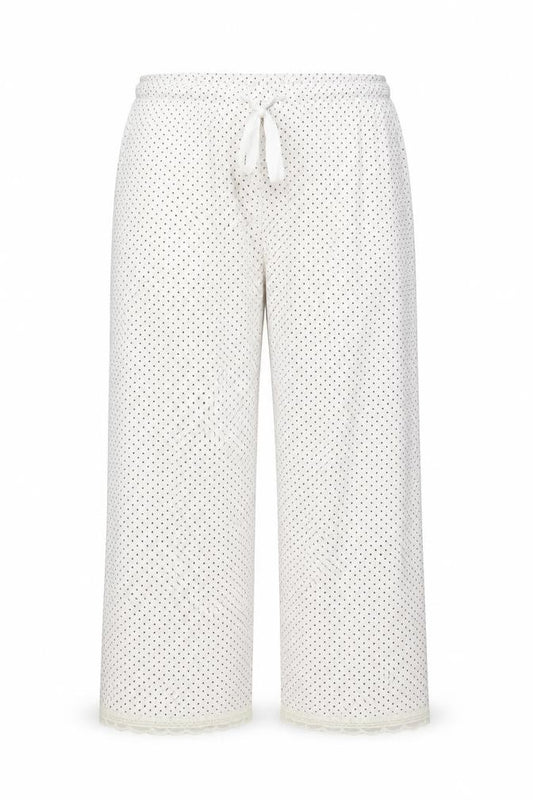 Front view of Secret Obsessions women’s ivory polka dot trousers, size L, 22-inch leg