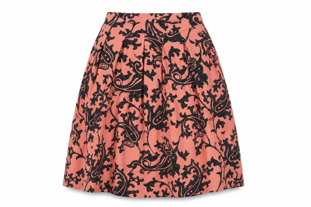 Front view of H&M women’s pink geometric a-line skirt, size UK 10