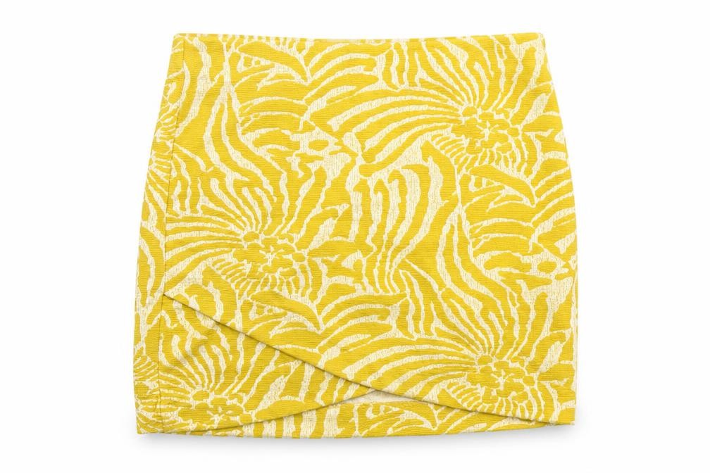Front view of H&M women’s yellow geometric a-line skirt, size M