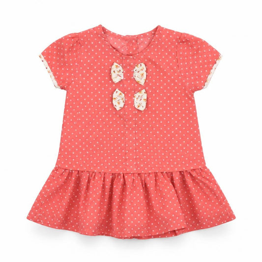Front view of Preworn girls’ pink spotted fit & flare, size 12, months