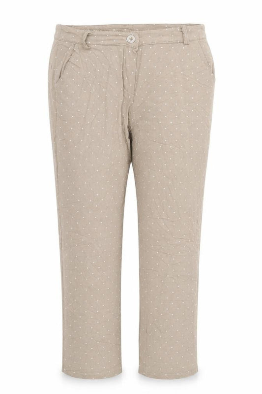 Front view of Preworn women’s beige trousers, size UK 24, in, 25-inch leg - star print