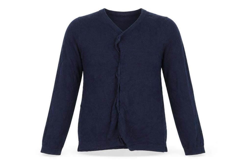 Front view of H&M girls’ blue cardigan jumper, size 6, years