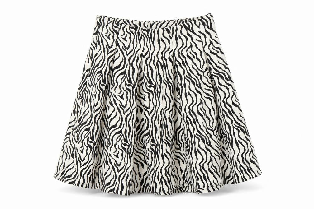 Front view of H&M women’s white animal print a-line skirt, size UK 8