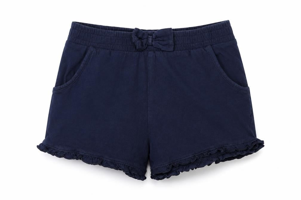 Front view of Tu girls’ blue jersey hot pants shorts, size 7, years