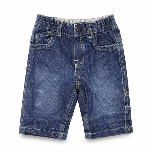 Front view of Cherokee boys’ blue denim capri jeans, size 0-3, months