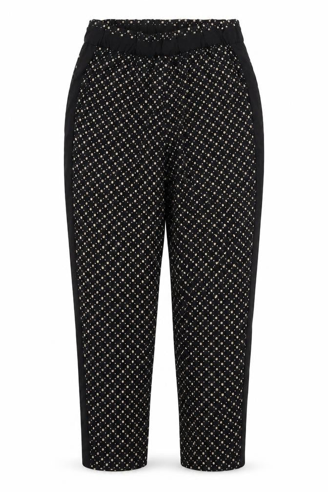 Front view of H&M women’s black floral trousers, size UK 10, 25-inch leg