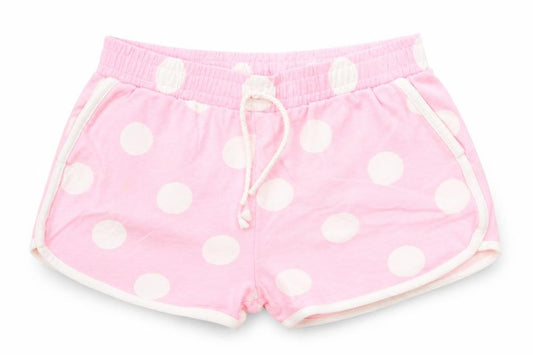 Front view of Tu girls’ pink polka dot hot pants shorts, size 6, years
