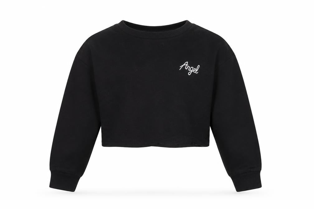 Front view of SHEIN girls’ black jumper, size 10, years