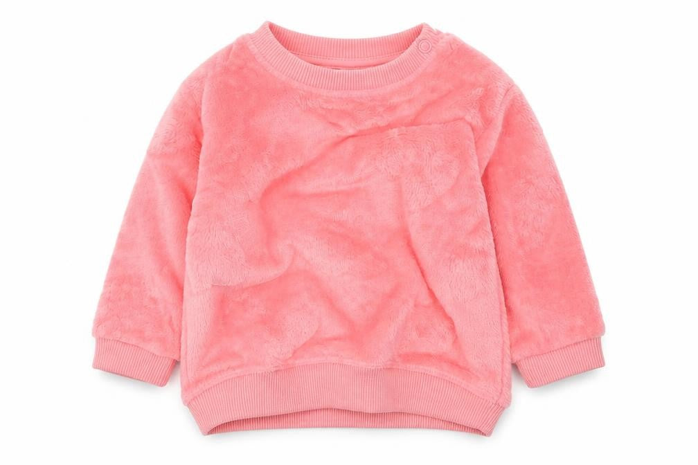 Front view of H&M girls’ pink jumper, size 6-9, months