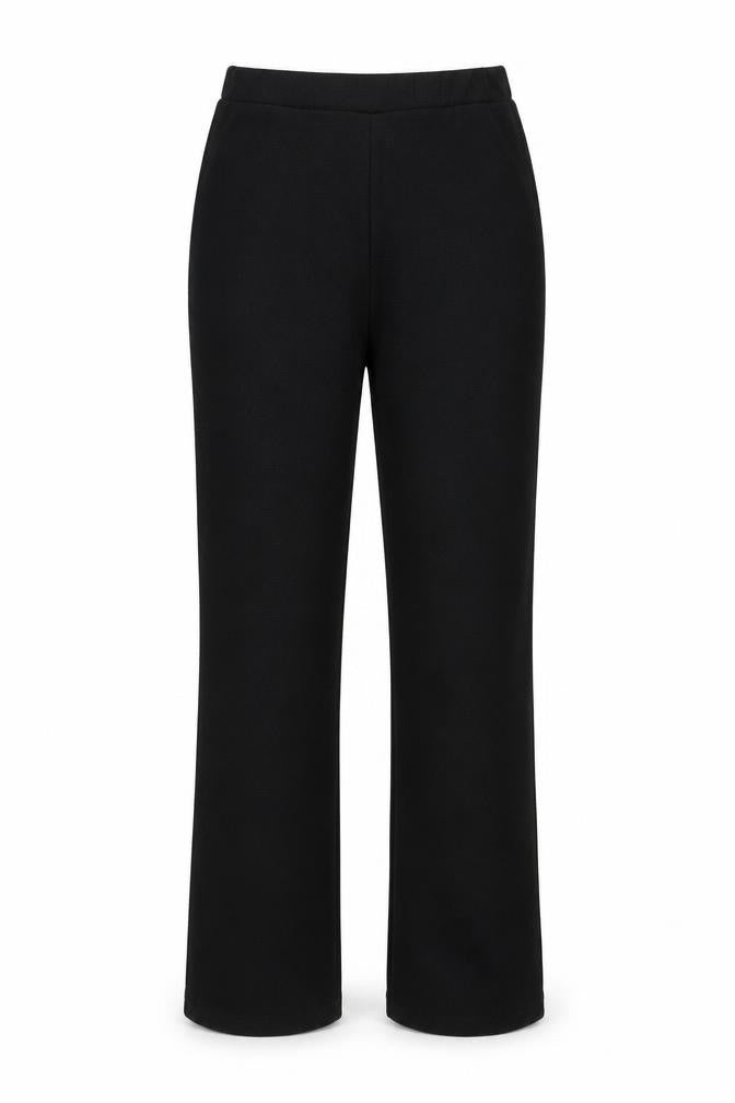 Front view of PRETTYLITTLETHING women’s black trousers, size UK 14, 29-inch leg