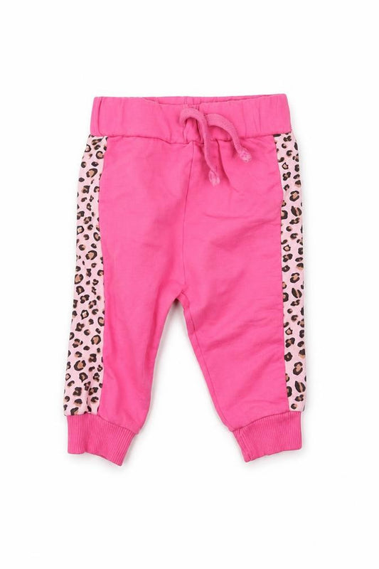 Front view of Studio girls’ pink animal print jogger trousers, size 3-6, months