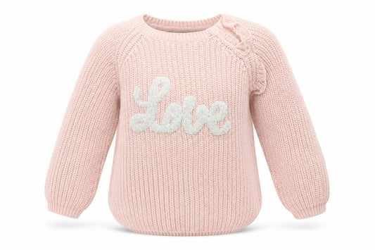 Front view of Primark girls’ pink jumper, size 2, years
