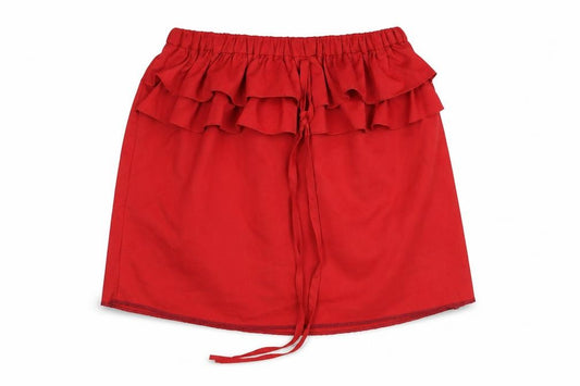 Front view of Preworn girls’ red mini skirt, size M