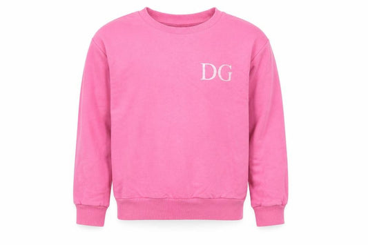 Front view of Studio girls’ pink pullover sweatshirt, size 5-6, years