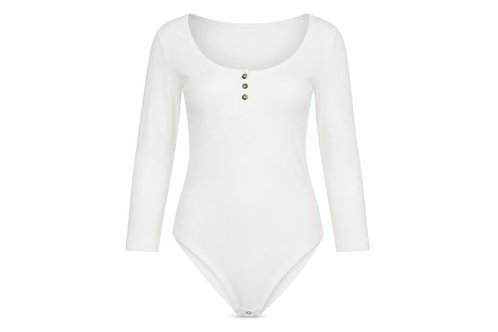 Front view of F&F women’s silver jumpsuit one-piece, size UK 6