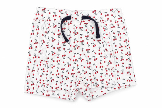Front view of Primark girls’ white polka dot pyjama pants, size 18-24, months - cherries