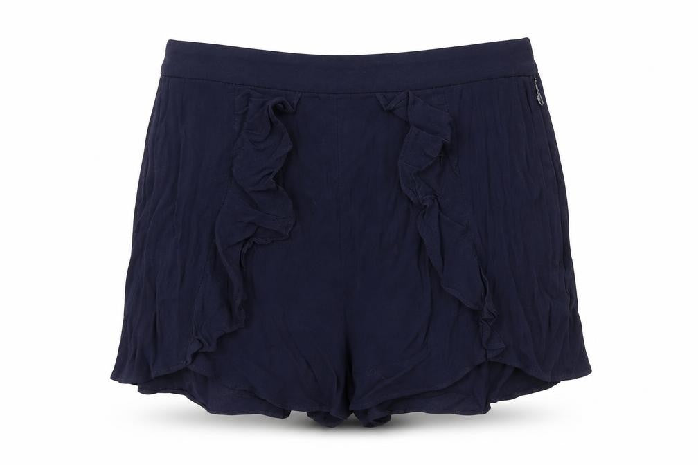 Front view of H&M women’s blue hot pants shorts, size UK 34
