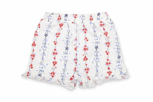 Front view of Matalan girls’ white floral cropped trousers, size 9-12, months