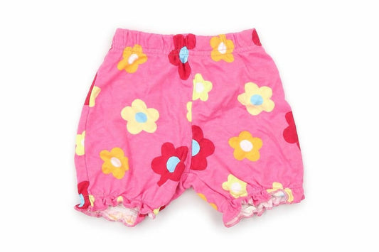 Front view of Preworn girls’ pink floral cropped trousers, size 3-6, months