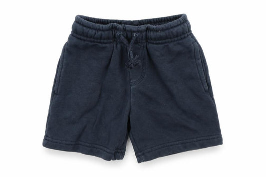 Front view of Nutmeg boys’ blue cropped trousers, size 12, months