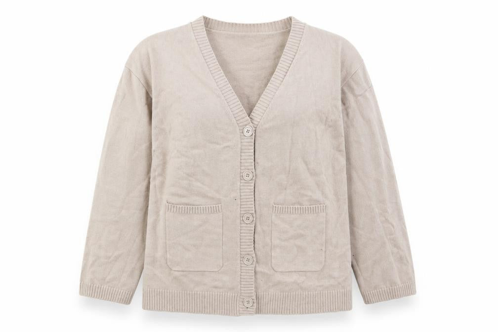 Front view of Collusion women’s beige cardigan jumper, size UK 10