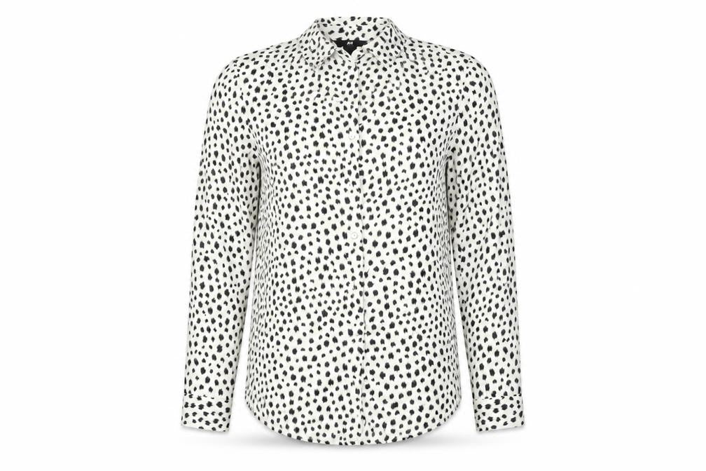 Front view of H&M women’s white animal print basic button-up, size UK 2