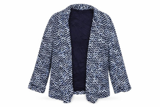 Front view of Preworn women’s blue geometric cardigan jumper, size M
