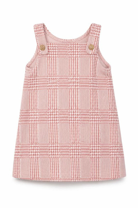 Front view of Primark girls’ pink houndstooth a-line, size 9-12, months