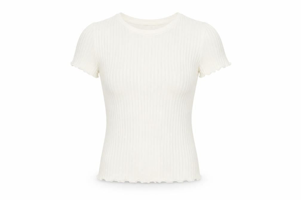 Front view of Zara girls’ white basic t-shirt, size S