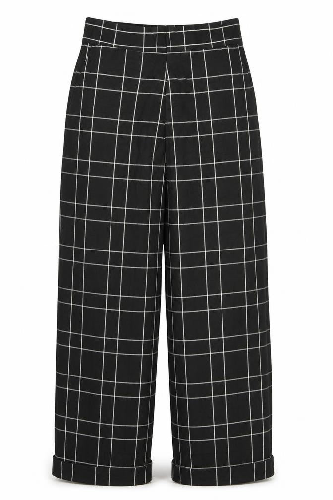 Front view of Preworn women’s black rayon trousers, size UK 32, 32-inch leg