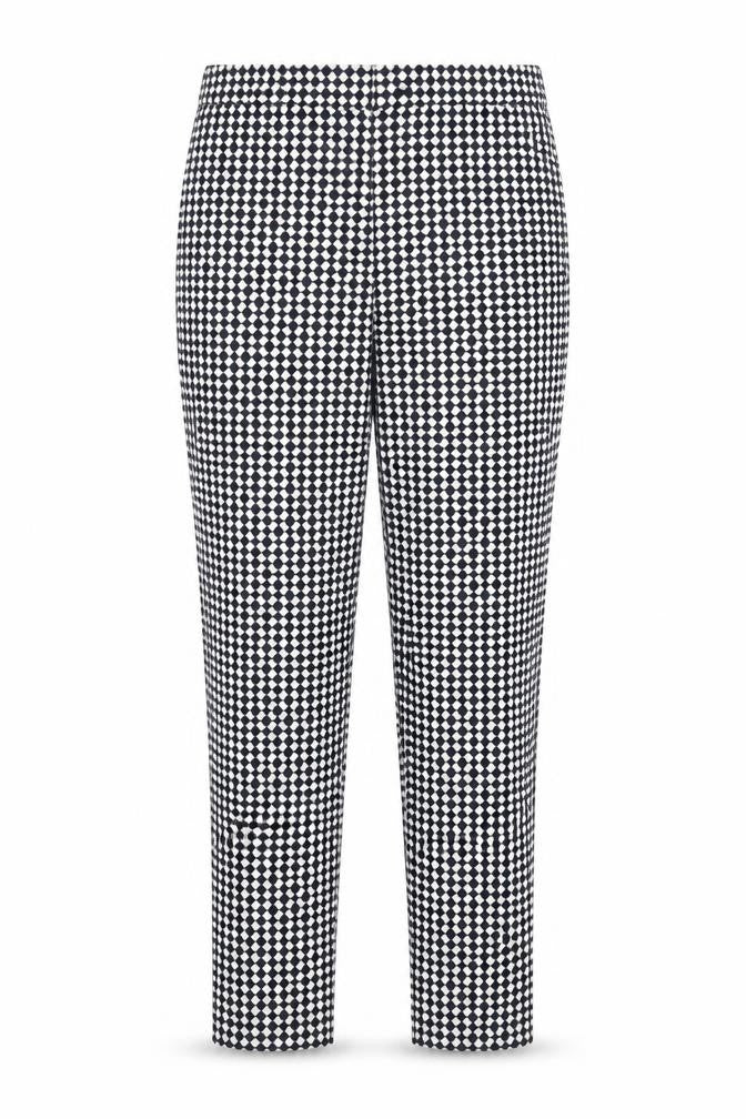 Front view of H&M women’s white polka dot trousers, size UK 6, 26-inch leg