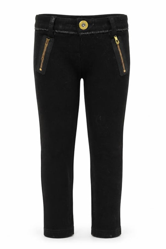 Front view of Next girls’ black jegging trousers, size 5, years