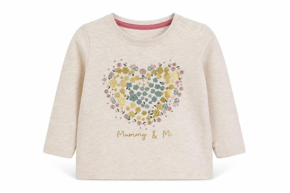 Front view of Primark girls’ beige basic t-shirt, size 6-9, months